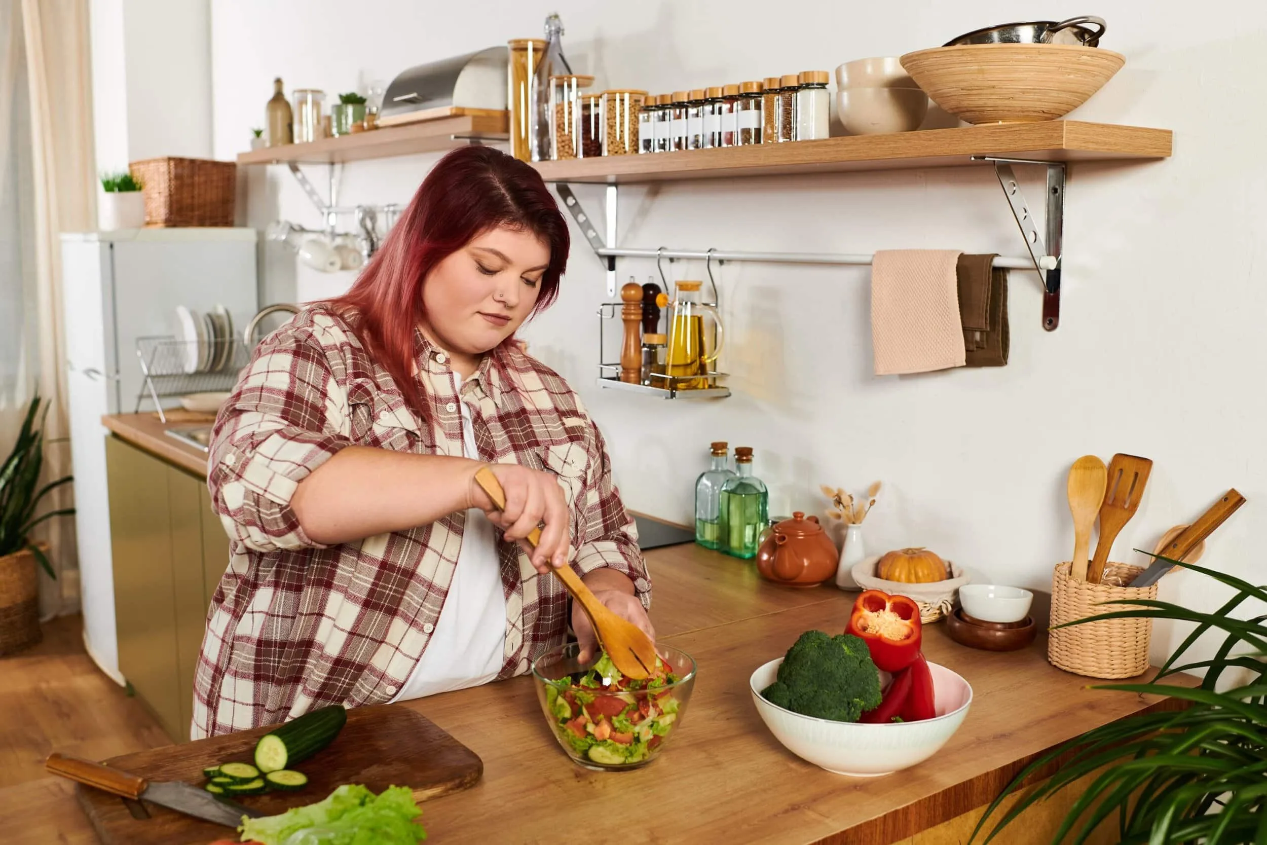 A,Young,Plus,Size,Woman,Mixes,Fresh,Vegetables,In,A