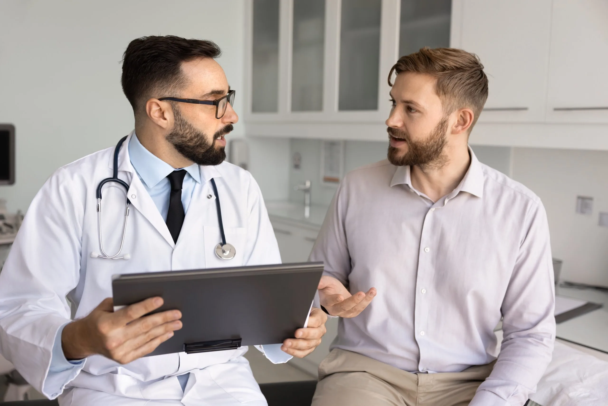 Hispanic,Male,Physician,Giving,Consultation,To,Patient,After,Examination,,Explaining Adult, Male, Man